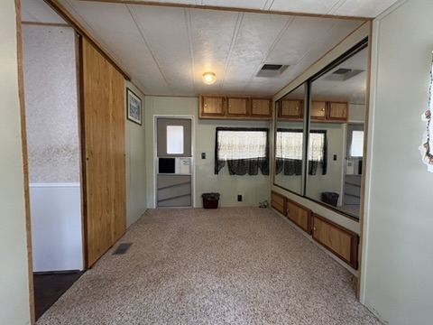 Bedroom viewed from the back side of the room